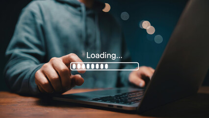 Man patiently waiting for data to load on laptop, perfect for technology and internet concepts