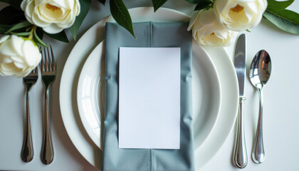 Menu mockup. Empty menu template on table setting with white flowers and cutlery