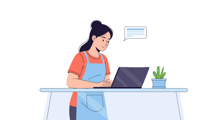Young woman wearing an apron works on a laptop at a desk with a plant
