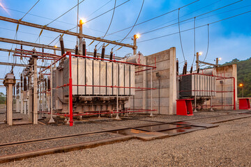 A close-up of a power transformer within an electrical substation in Brazil, showcasing the complex...
