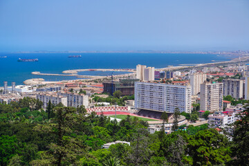 Alger the capital city of Algeria, North Africa, city centre of Algiers, the capital of Algeria, Landscape of Algiers city With port and mediterranean sea and white buildings, Arab Maghreb Africa.
