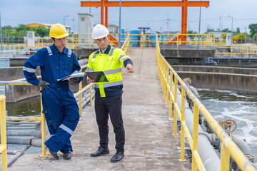 Environmental engineers work at wastewater treatment plants,Water supply engineering working at...