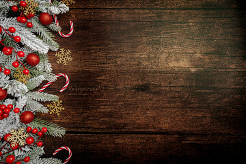 Christmas and New Year background with a festive scene with gold and red Christmas ornaments and...