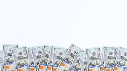 Hundred Dollar Bills Bordering a White Background for Financial Success and Abundance