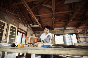 Female Carpenter in Workshop