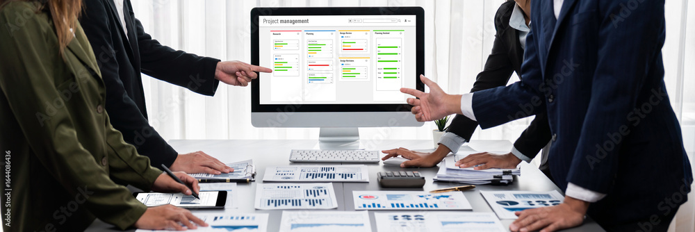 Poster panorama shot analyst team utilizing bi fintech to analyze financial report with laptop. businesspeo
