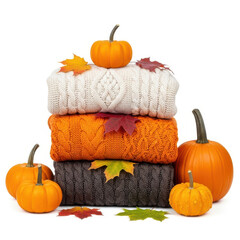 Cozy autumn sweaters and pumpkins isolated on white background