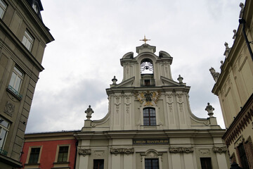 Obraz premium Kraków, Poland. Church of the Transfiguration is at the far end of ul. Św. Jana was completed in two stages back in the 18th century: the main body of the church was designed by Kacper