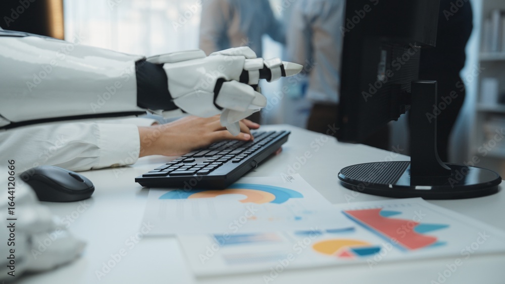 Poster a robotic hand skillfully types on a keyboard in an office setting, surrounded by analytical charts 