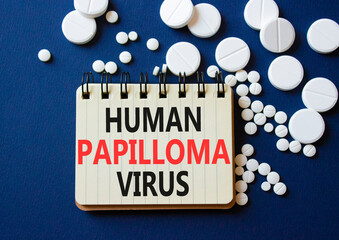 Human Papilloma Virus symbol. Concept word Human Papilloma Virus on notebook. Beautiful deep blue...