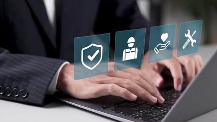 Work safety and compliance concept. Regulations and standard in industry. Businessman using laptop with safety icons on virtual screen for working standard process and zero accidents.