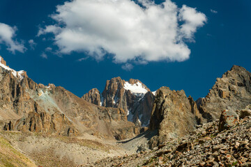 Majestic Korona peak dominates the Ala-Archa, Ratsek camp, landscape with rugged cliffs, snow...