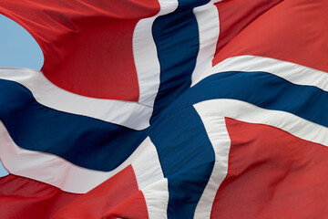 Close-Up of Waving Norwegian Flag with Red, White, and Blue Nordic Cross Design