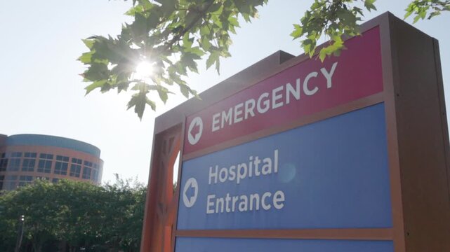Emergency Sign at Hospital in USA. Emergency Room and Medical Care Building. Hospital, Medical Center, Emergency Room.