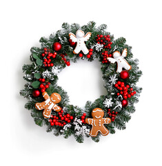 Realistic Christmas wreath with snowy pine, red berries, gingerbread cookies and festive snowflakes