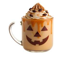 A halloween themed drink in a clear mug with whipped cream and caramel drizzle on a black background