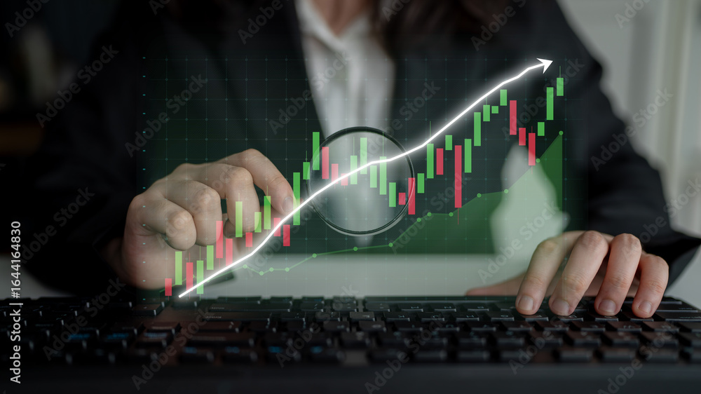 Poster a focused businessman analyzes stock market trends using computer graphics and indicators. he highli