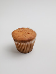 Vanilla cupcake on white background