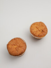 Vanilla cupcake on white background