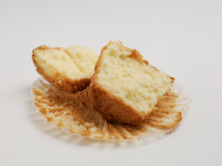 Vanilla cupcake on white background