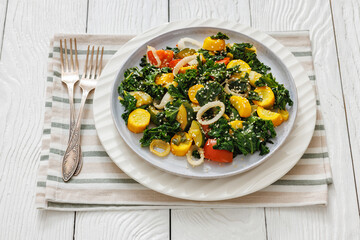 zucchini kale tomato saute sprinkled with sesame