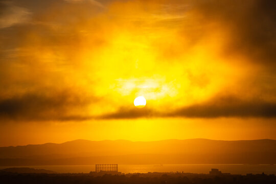 sunset over edinburgh over the firth of forth, view from calton hill, edinburgh, scotland