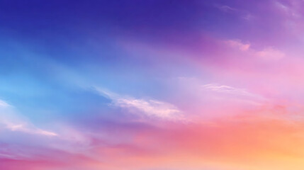 Obraz premium Vivid sky gradient with soft clouds transitioning from deep blue through purple and pink to warm orange