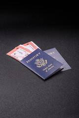US passport or id document with tickets for flight, travel, border crossing. US passport and tickets
