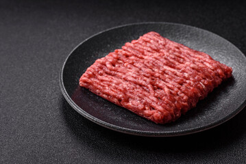 Raw minced beef or pork, ground meat for burgers. Raw minced meat