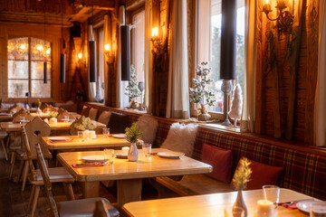 Cozy alpine restaurant interior in winter, Austria