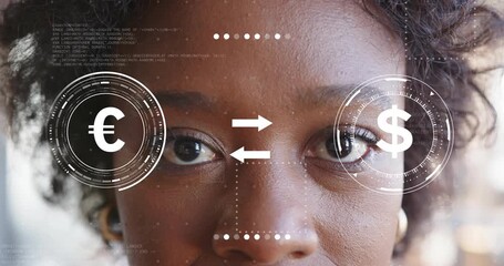 Mid adult woman using translucent HUD showing euro and dollar and animating finance exchange arrows - Powered by Adobe