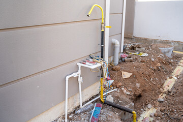 Natural gas pipe and water pipes installed for natural gas full condensing boiler
