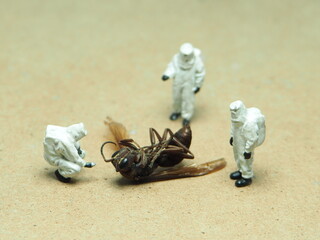 Mini toy of action figure at table with blurred background. Miniature photography concept design....