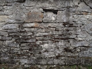 Background of very old stone wall texture photo