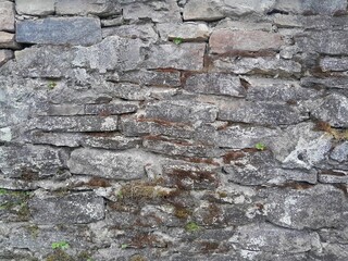 Background of very old stone wall texture photo