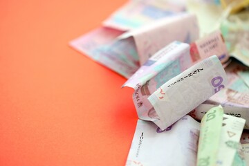 Big amount of Ukrainian hryvnia money bills. Pile of crumpled ukrainian banknotes