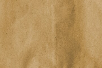 Brown crumpled recycled paper texture background. Kraft Paper