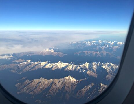 High-altitude view of snowy mountain ranges