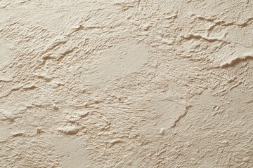 Light cream colored plaster wall with subtle texture for elegant design.