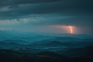 Obraz premium Lightning storm striking distant hills under dark layered clouds.