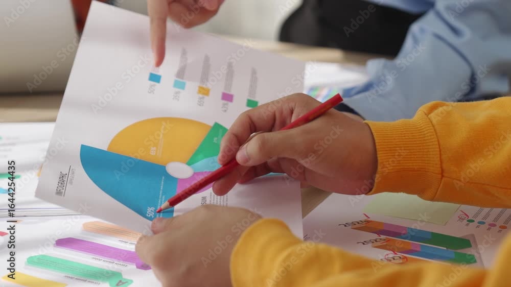 Poster startup company employee work together, analyze colorful bi dashboard paper with financial data repo