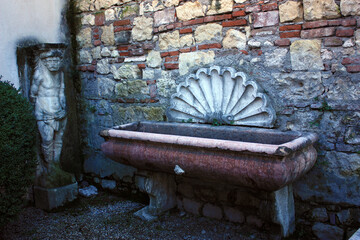 House of the Tomb of Julia in Verona, Italy, Water Basin and Statue of a Turk
