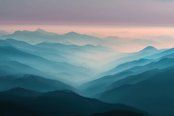 Fototapeta premium Misty mountain landscape at dawn with layered atmospheric depth.