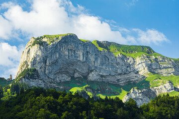 Scenic view of majestic Swiss Alps mountains near Seealpsee in Appenzell, Switzerland, with...