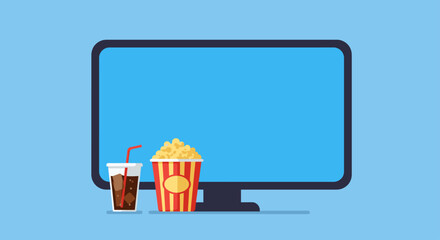 Fototapeta premium Television set with popcorn and a soda on a blue background