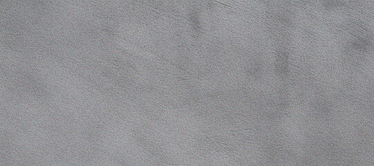 Naklejka premium Soft gray paper texture presents a clean, minimal surface with subtle shadows, ideal for product display, branding, or video backdrop.