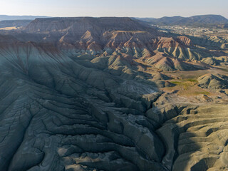 Aerial view of Rainbow Hills in Nallıhan, Turkey. Vibrant geological layers, striped terrain, and...