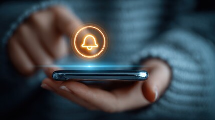 Person using mobile phone with notification bell icon and digital rings, receiving notifications