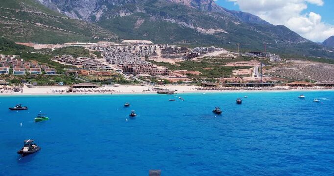 Aerial view of beach clubs along the Himare Albanian Riviera coastline on the Ionian Sea in southern Albania beside vlore.