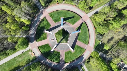 Monumental monument in the form of a pentagram. Pentagram in architecture. Monument to war victims...